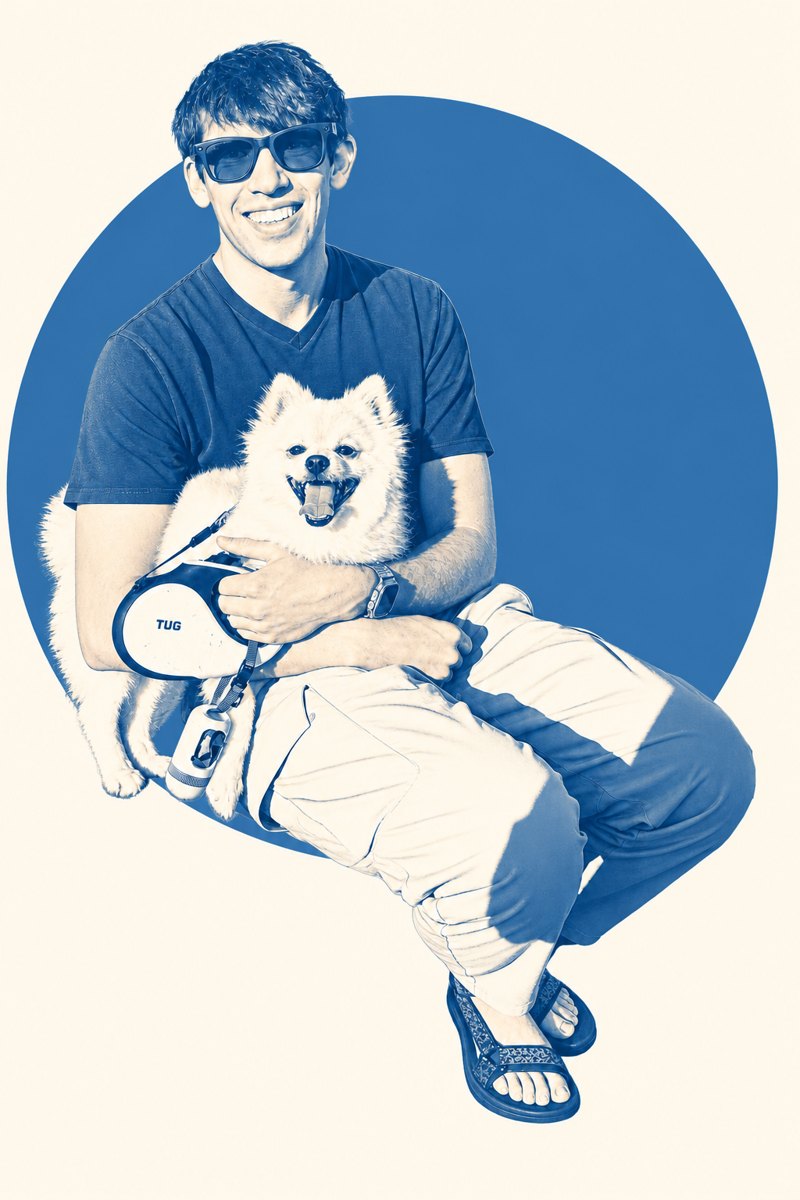 Keldon in sunglasses holding his Pomeranian, on a blue circle